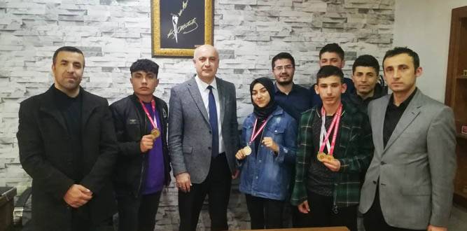 Şampiyon,Türkoğlu İlçe Millî Eğitim Müdürünü Ziyaret Etti